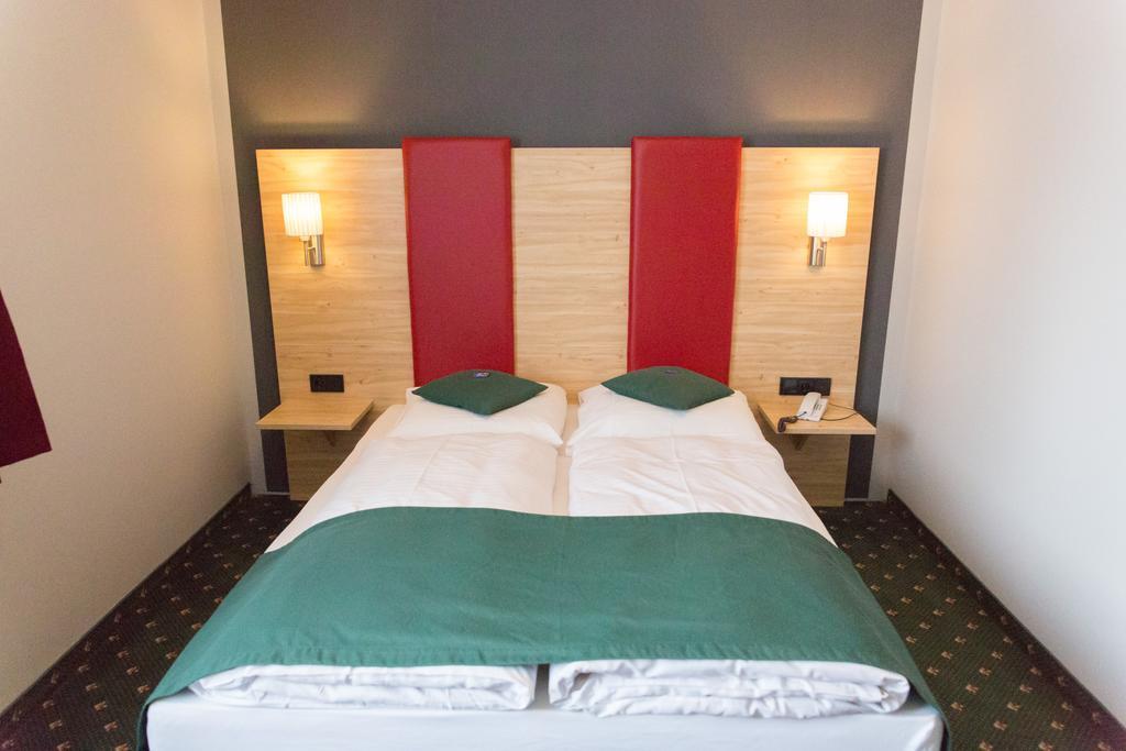 Hotel Cosima Vaterstetten Bilik gambar